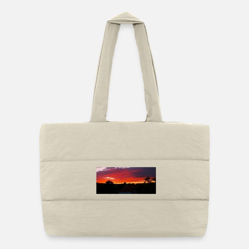 Sonnenuntergangs-Silhouette über Stadt Puffer-Einkaufstasche