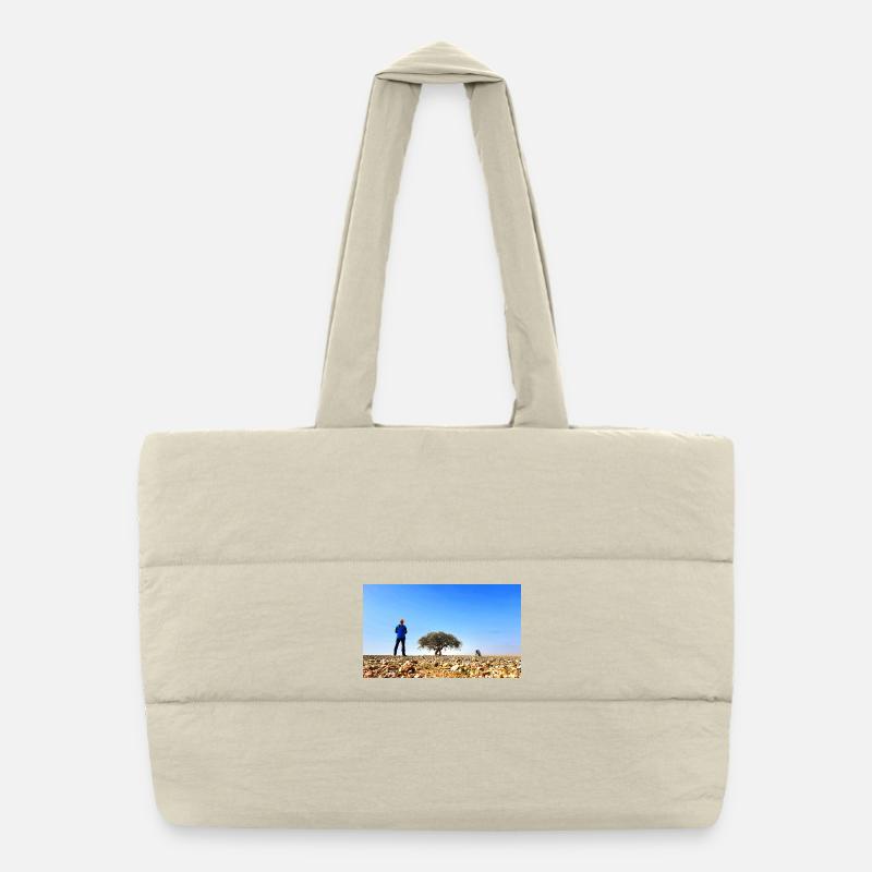 Explorateur solitaire avec arbre et vélo Sac shopping matelassé