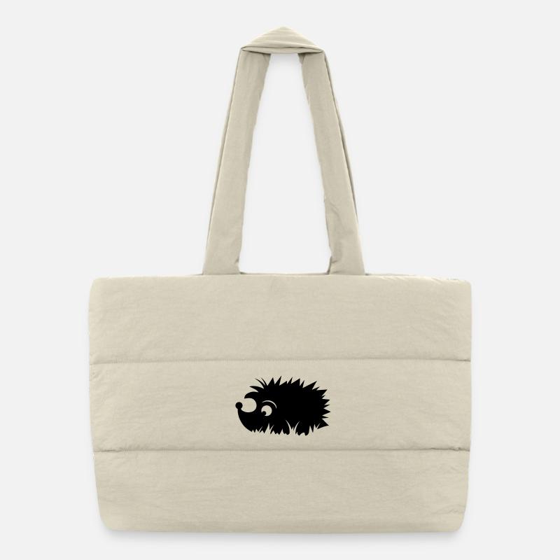 A hedgehog is sitting in a meadow Puffer Shopping Bag