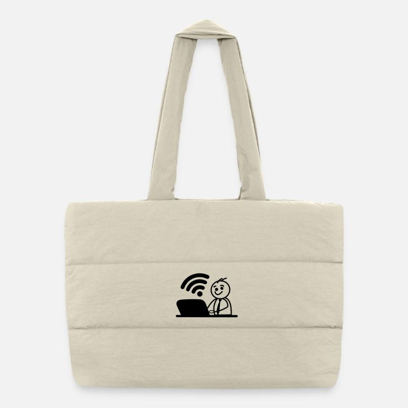 Glücklicher junger Mann auf Laptop-WLAN sendet eine Nachricht Puffer-Einkaufstasche