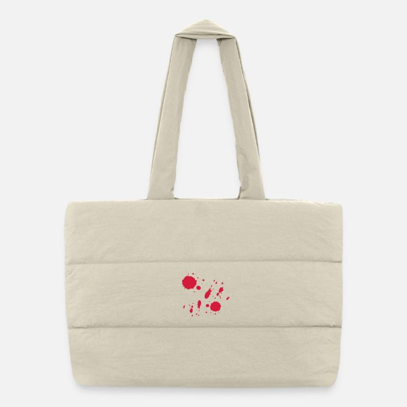 La peinture rouge éclabousse un motif abstrait Sac shopping matelassé