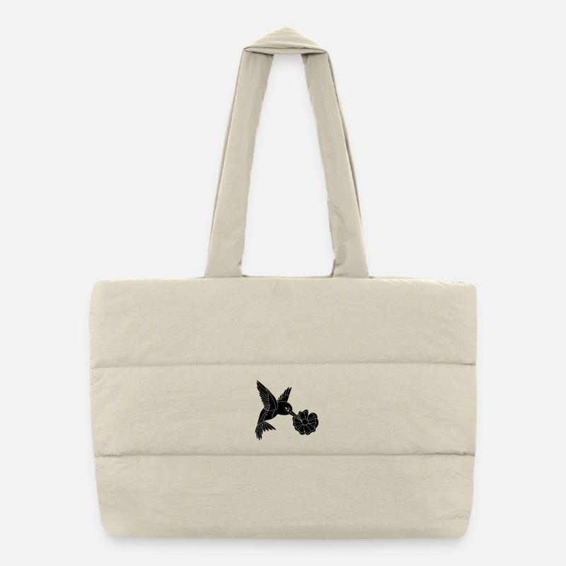 Schwarzer Vogel auf Nahrungssuche Puffer-Einkaufstasche