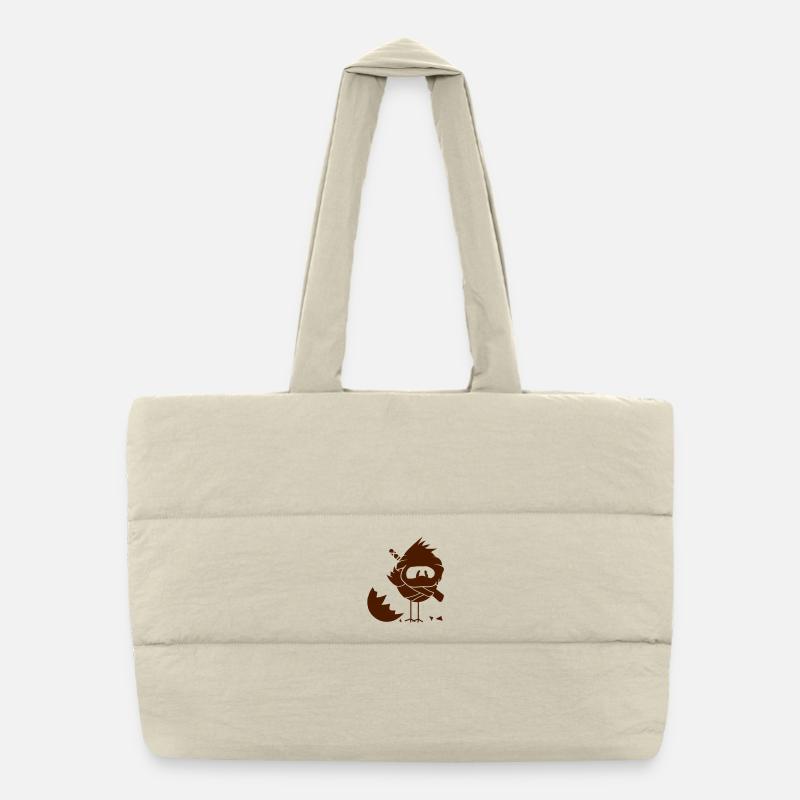 Un poussin nouvellement éclos en tenue de ninja et Sac shopping matelassé
