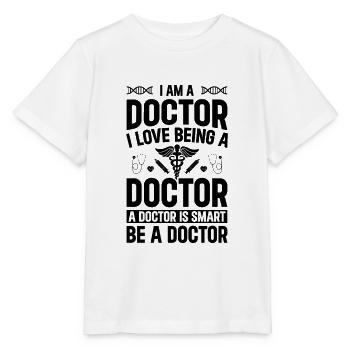 Je suis médecin. J’adore être médecin. Un médecin est - T-shirt bio MINI CREATOR Stanley/Stella Enfant - blanc - Devant - Maike (125cm)