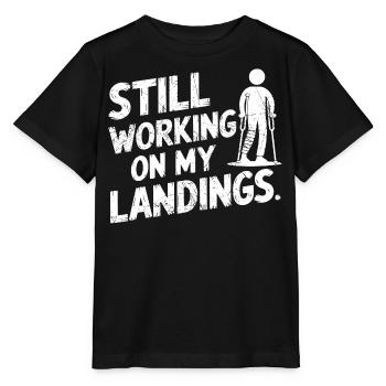Still Working On My Landing | Funny Broken Leg - T-shirt bio MINI CREATOR Stanley/Stella Enfant - noir - Devant - Mikhail (115cm)