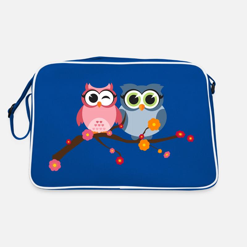 Deux oiseaux hiboux mignons sur une branche avec des fleurs Sac Retro