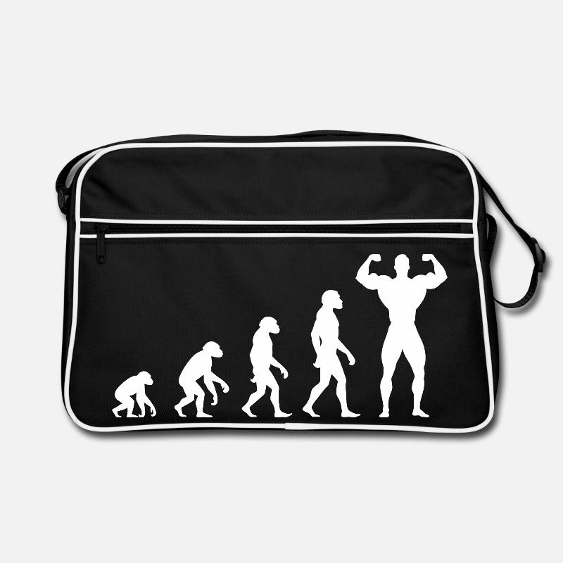 Evolution vom Urmenschen zum Muskelprotz Retro Tasche