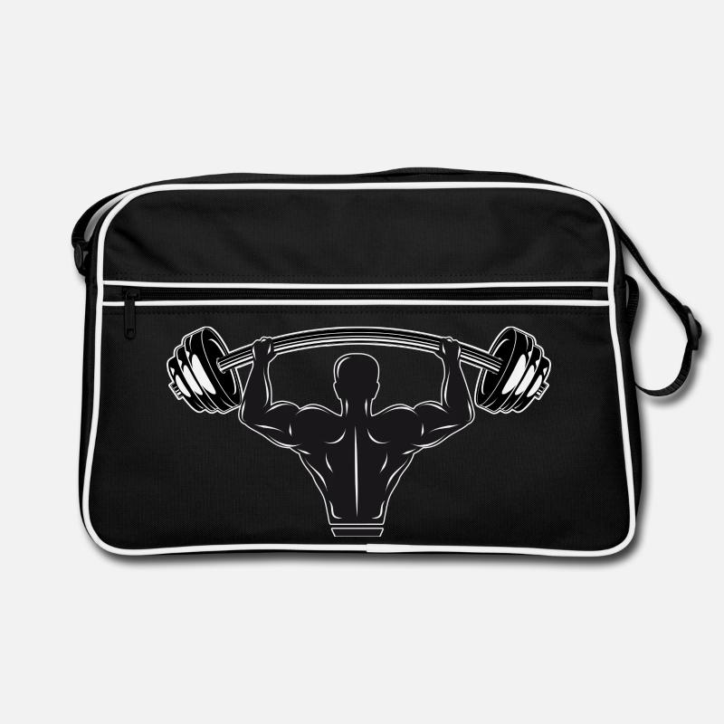 Haltère à la main - bodybuilder avec poids Sac Retro