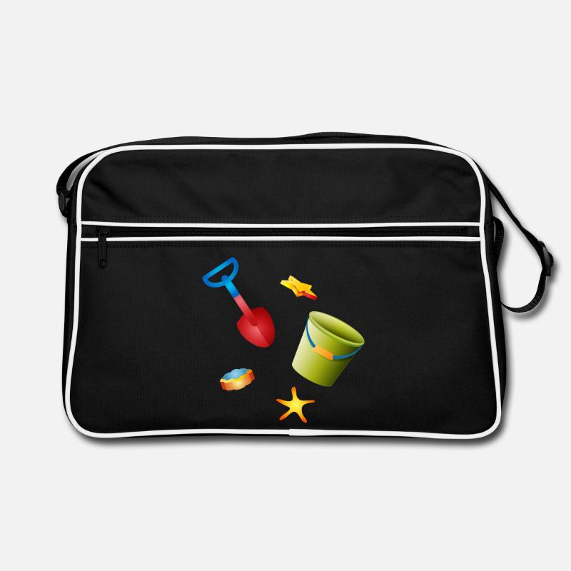 Bunte Schaufel und Eimer mit Förmchen am Strand Retro Tasche