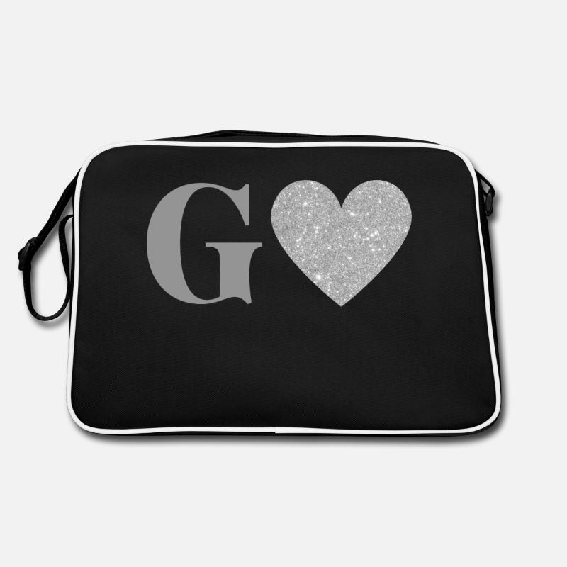 Buchstabe g silbernes Herz Retro Tasche
