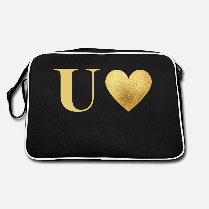 Buchstabe u goldenes Herz Retro Tasche