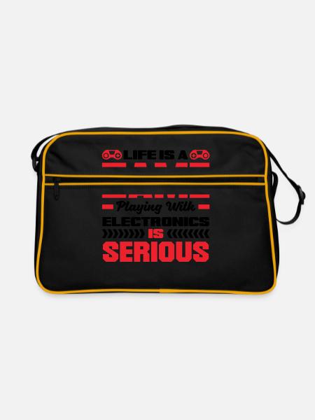 Life Is A Game Playing With Electronics Is Serious - Retro Tasche - Schwarz/Gold - Vorne