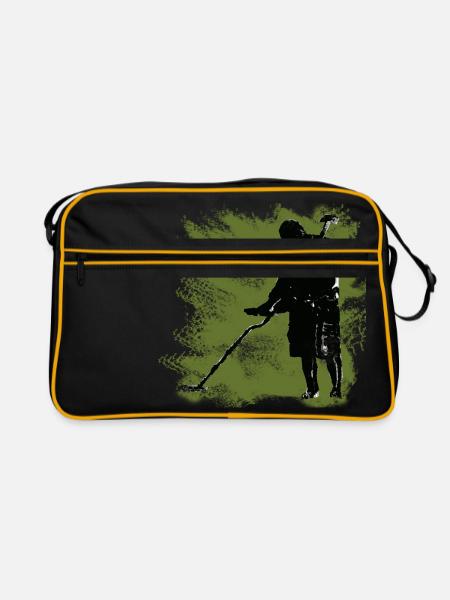 Ein Schatzsucher mit dem Metalldetektor und Spaten - Retro Tasche - Schwarz/Gold - Vorne