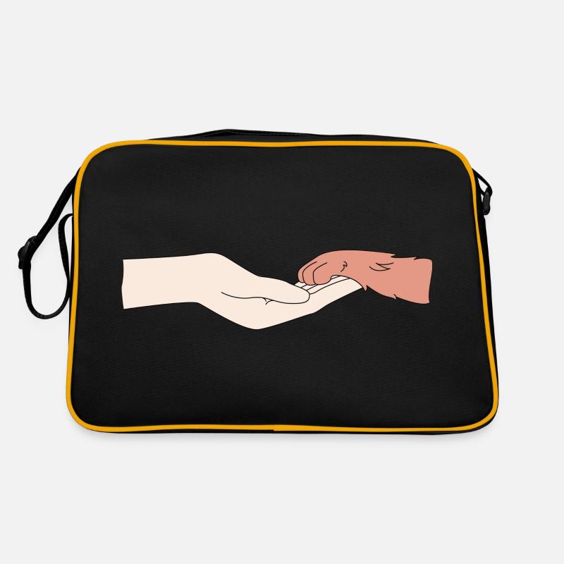 Eine menschliche Hand und eine Hunde Pfote Retro Tasche