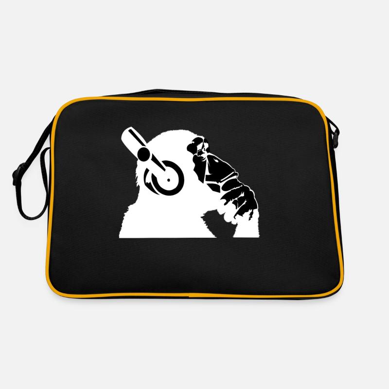 Schimpanse mit Kopfhörern der Musik hört Retro Tasche