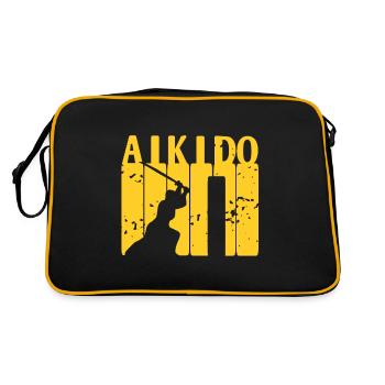 Un combattant d’Aïkido s’entraîne à l’épée dans le dojo - Sac Retro - noir/or - Dos