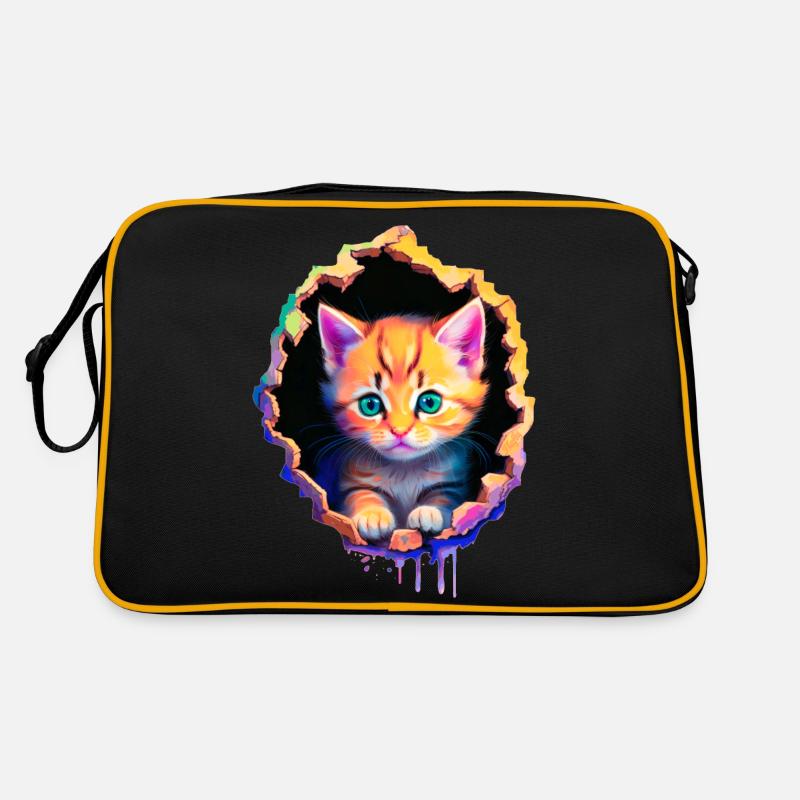 Orange Kitten coming out from inside Retro Bag
