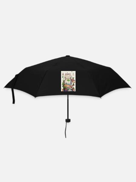 Un chat câlin sur une pile de livres - Parapluie standard - noir