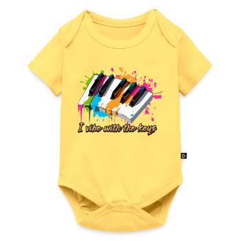 En harmonie avec les touches du piano - Pianiste - Body à manches courtes Premium Bébé - jaune pastel - Devant