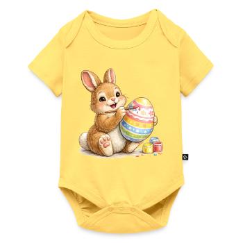 Bunny happily paints a colorful Easter egg - Baby Premium short-sleeve bodysuit - sky yellow - Front