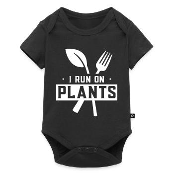 Je suis propulsé par les plantes Légumes - Body à manches courtes Premium Bébé - noir - Devant