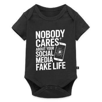Personne ne se soucie de votre fausse vie sur les réseaux sociaux - Body à manches courtes Premium Bébé - noir - Devant