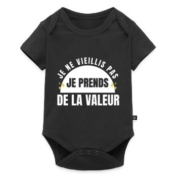Je ne vieillis pas je prends de la valeur - Body à manches courtes Premium Bébé - noir - Devant