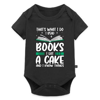 C'est drôle c'est ce que je fais Je lis des livres Je mange des gâteaux - Body à manches courtes Premium Bébé - noir - Devant