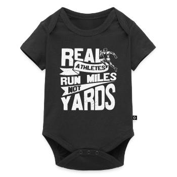 Les vrais athlètes courent des kilomètres et non des verges motivationnelles - Body à manches courtes Premium Bébé - noir - Devant
