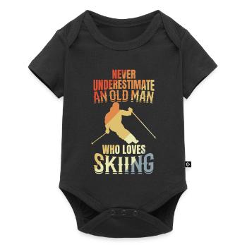 Ne sous-estimez jamais un vieux skieur - Body à manches courtes Premium Bébé - noir - Devant