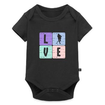 Un joueur de hockey - Body à manches courtes Premium Bébé - noir - Devant