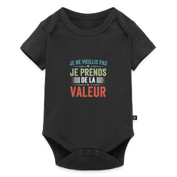 Je ne vieillis pas, je prends de la valeur - Body à manches courtes Premium Bébé - noir - Devant
