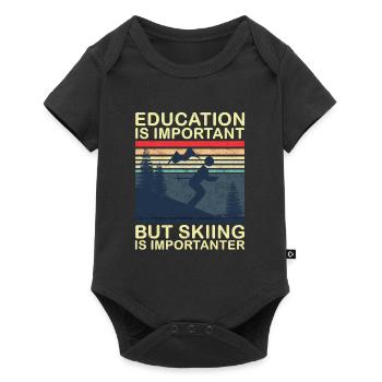 L’éducation est importante, mais le ski est plus important - Body à manches courtes Premium Bébé - noir - Devant