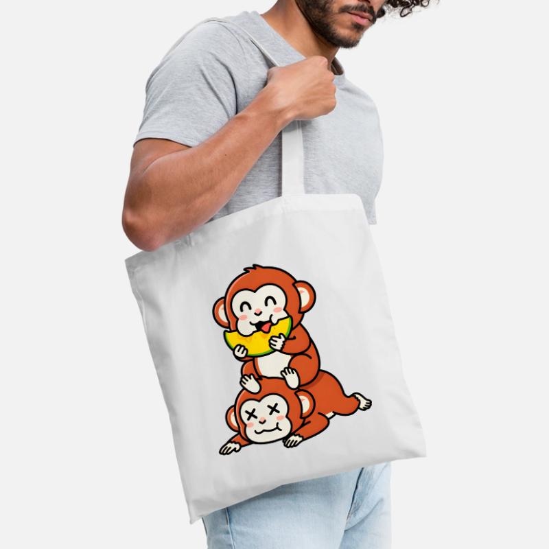 Singe espiègle mangeant de la pastèque sur un ami Sac en tissu