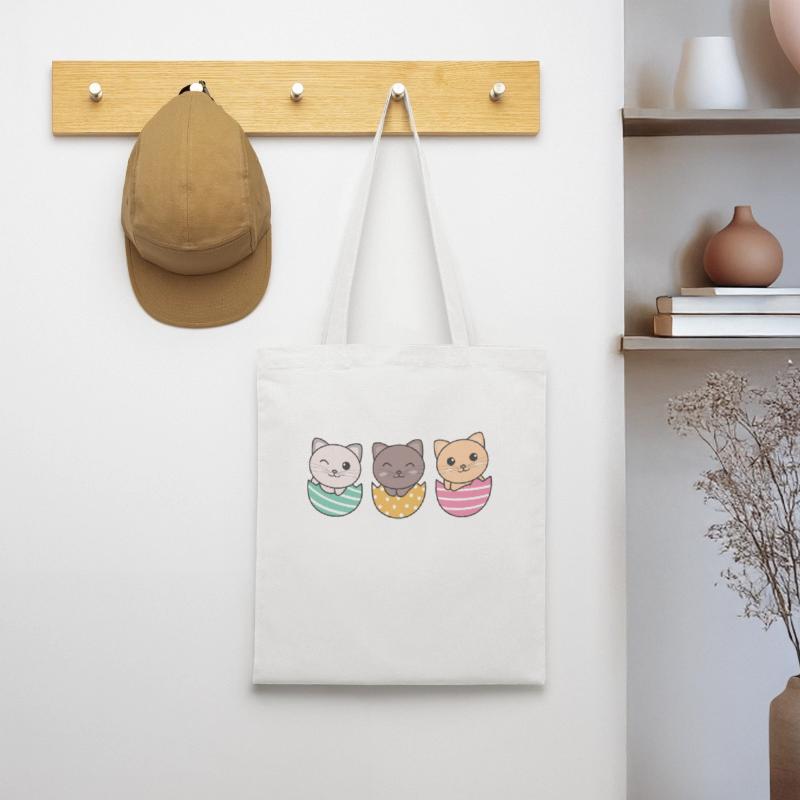 cute cats at Easter with Easter eggs cat Tote Bag