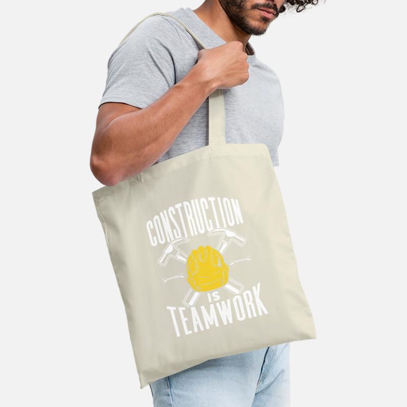 Construction work is teamwork Construction site Teamwork Construction Tote Bag