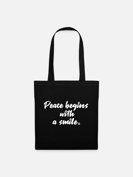 Peace begins with a smile Zitat Frieden - Stoffbeutel - Schwarz