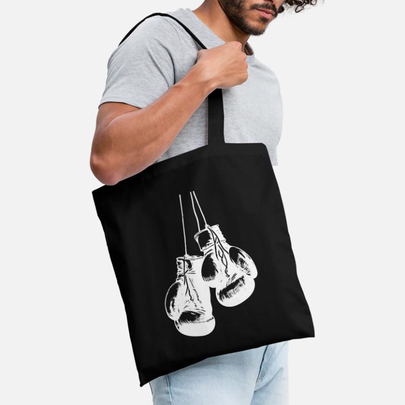 Conception de gants de boxe blancs suspendus. Conception de logo Sac en tissu
