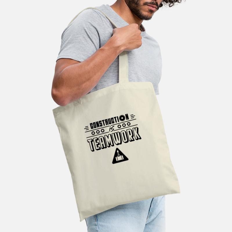 Construction work is teamwork construction site construction workers Tote Bag