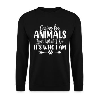 Mich um Tiere zu kümmern, ist nicht das, was ich tue, sondern wer ich bin - Unisex Pullover - Schwarz - Vorne - Alina (178cm) & Michal (187cm)