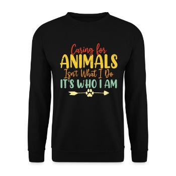 Mich um Tiere zu kümmern, ist nicht das, was ich tue, sondern wer ich bin - Unisex Pullover - Schwarz - Vorne - Alina (178cm) & Michal (187cm)
