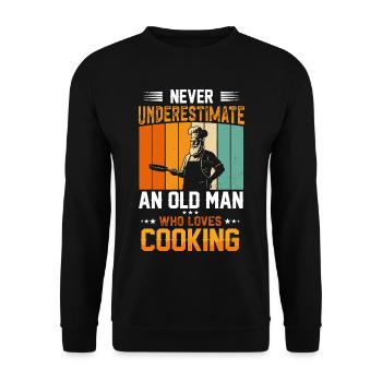 Never Underestimate an Old Man Who Cooks - Unisex Pullover - Schwarz - Vorne - Alina (178cm) & Michal (187cm)
