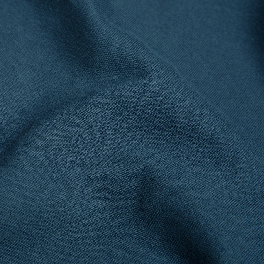 Hollow Peak badge on a unisex sweatshirt, indigo blue, close-up