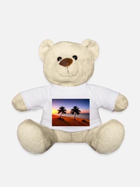 Coucher de soleil sur la plage avec des palmiers - Nounours - blanc