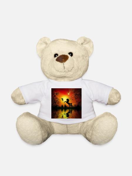 Einhorn und Fee spielen bei Sonnenuntergang. - Teddy - Weiß