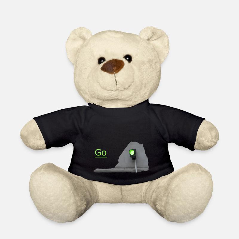 Le feu de circulation brille en vert devant le gris - Nounours - noir