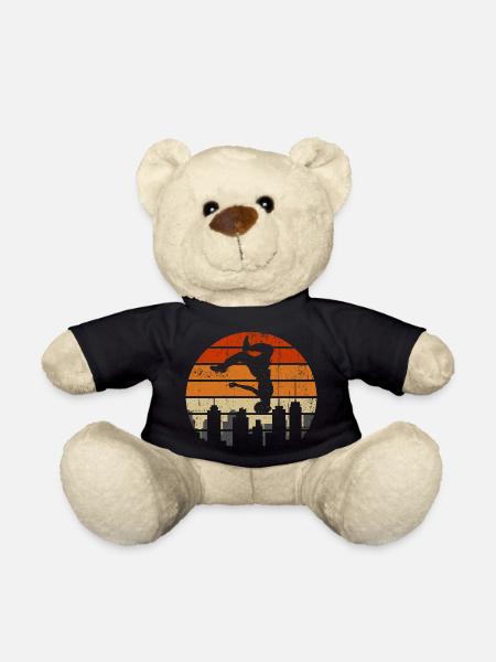 Sunset Acrobat Over City Skyline - Teddy Bear - black