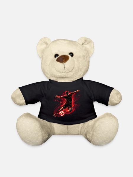 A footballer in a dynamic action with a shot on goal. - Teddy Bear - black