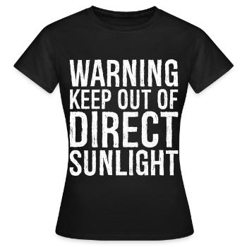 warning keep out of direct sunlight funny - Women's T-Shirt - black - Front - AI Model Female 172 dark (172cm)