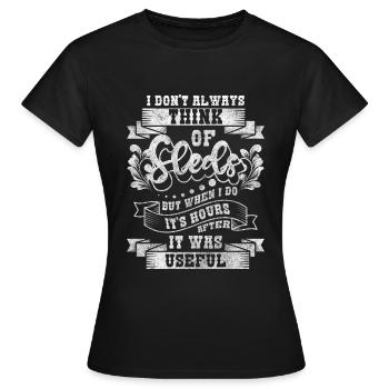 Rodeln Schnee Winterurlaub - Frauen T-Shirt - Schwarz - Vorne - AI Model Female 172 dark (172cm)